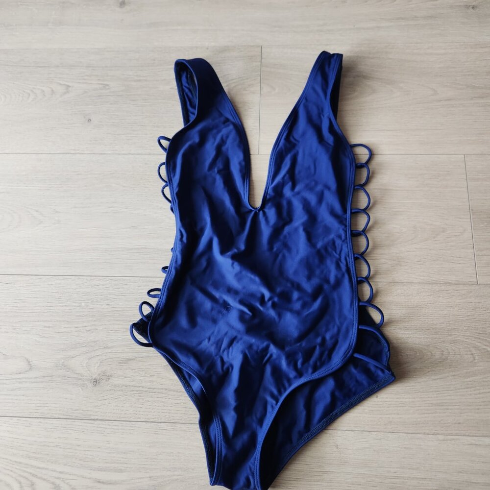 Blue cross strap sexy one piece bathing suit size small